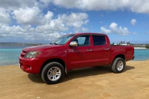 Tropical car rental Bonaire - Toyota Hilux rood te huur
